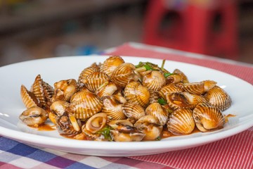 Grilled Blood Cockle Shells at Siem Reap city restaurant in Cambodia.
