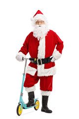 Santa claus posing with a scooter