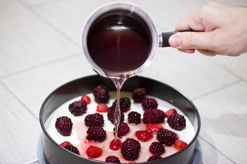 Cooking berry cheesecake.