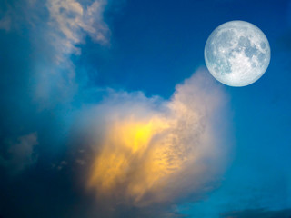 Fototapeta na wymiar super full moon gold cloud in the blue sky