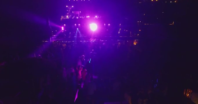 Party on club in Goa, India. Aerial view. Night