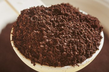 a spoonful of coffee, ground for espresso