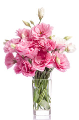 Naklejka na ściany i meble bunch of pink eustoma flowers in glass vase