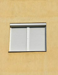 Closed shutters on the window