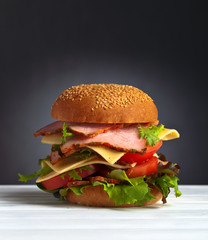 burger with salad, cheese and ham