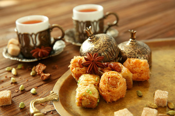 Fresh tea composition on wooden background