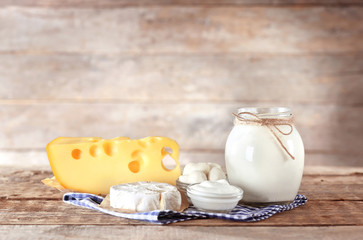 Dairy products on wooden background