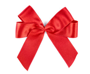 Festive red bow on white background