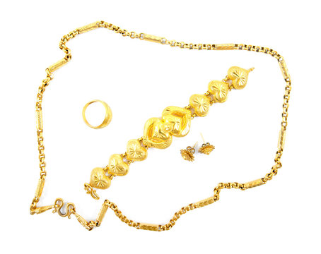Wedding gold jewelry for bride.Ornament gold set isolated on whi