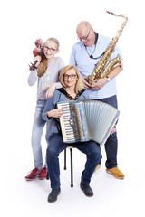 musical family with saxophone, violin and accordion in studio