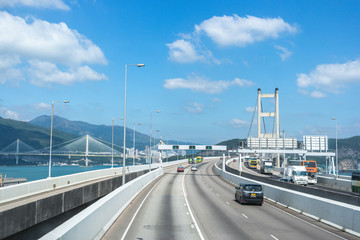 Fototapeta na wymiar Passing through the Suspension Kap Shui Mun bridge in Hong Kong