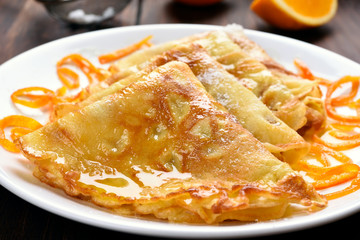 Pancakes with sauce from orange