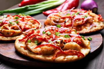 Pizza with chicken meat and vegetables