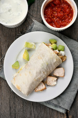 Homemade fajitas with chicken and avocado, top view