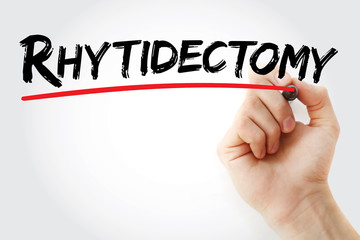 Hand writing Rhytidectomy with marker, health concept background