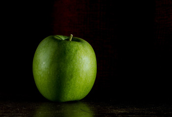 Green Apple Isolated on a black background
