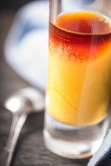 Cocktail of egg and cherry liqueur  vertical