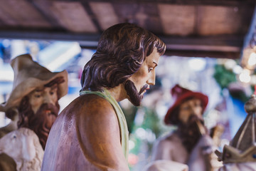 Detail of a wooden Christmas nativity scene in the square