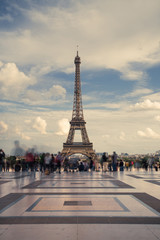 Fototapeta na wymiar Eiffel Tower. Paris. France. Famous historical landmark on the quay of a river Seine. Romantic, tourist, architecture symbol. Toned