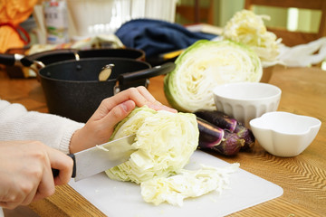 Cutting vegetables in a kitchen