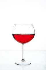 Red wine glass isolated on white background