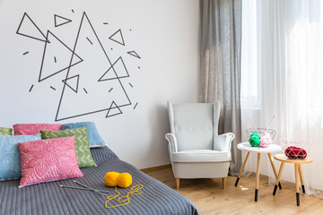 Bright bedroom knitting wool and needles