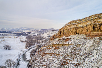 sandstone cliff and river aerial view