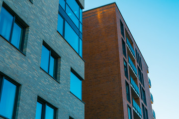 yellow and red brick buildings in a row