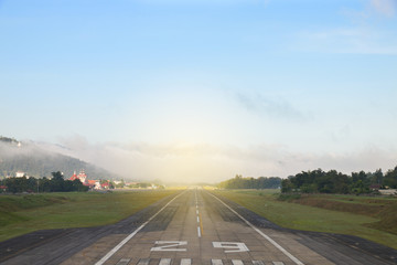 Airport runway with mountain in countryside