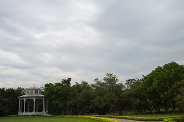 Obraz premium White pavilion in the garden.