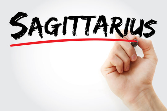 Hand writing Sagittarius with marker, concept background