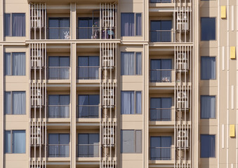 Fototapeta na wymiar Apartment building / View of balconies of apartment building.