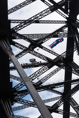 A group of people at the top of the Harbour Bridge in Sydney, Australia