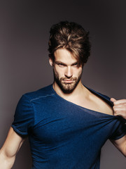 Serious man in fashionable shirt