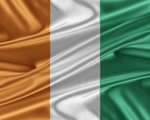 Cote d'Ivoire flag with a glossy silk texture.