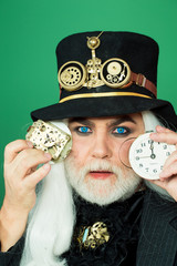 Senior bearded man or watchmaker