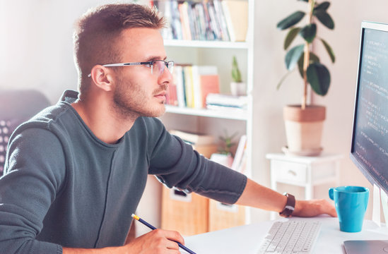 Freelance programmer working in home office