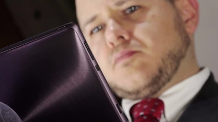 young businessman working with tablet computer
