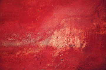Dirty old cement wall, colored red, For texture and background.