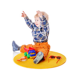 capricious boy sitting