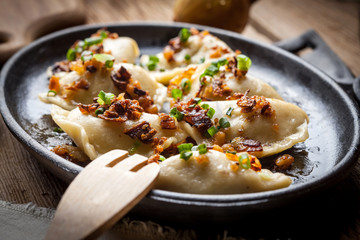 Dumplings with meat, onion and bacon.