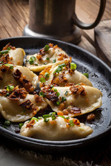 Dumplings with meat, onion and bacon.