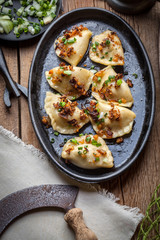 Dumplings with meat, onion and bacon.
