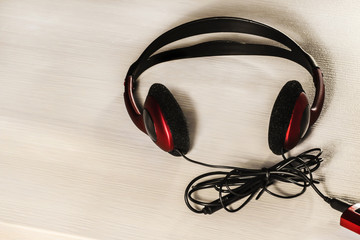red headphones and player