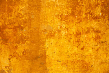 Background texture of the old rough concrete surface yellow. Design basis - Background. Empty space