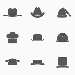 Set of hats monochrome icons. Safety helmet, bowler, top hat, graduation cap, chef, gangster, tourist, cowboy and Santa Claus hats. Vector illustration.