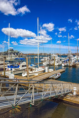 Pier of Long Wharf and sailboats in Boston