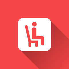 Man sitting on a chair icon