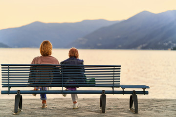Senior women sitting on bench in Ascona Swiss Resort