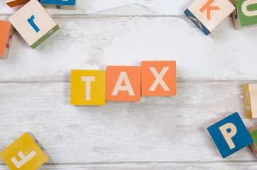 Tax word with colorful blocks
